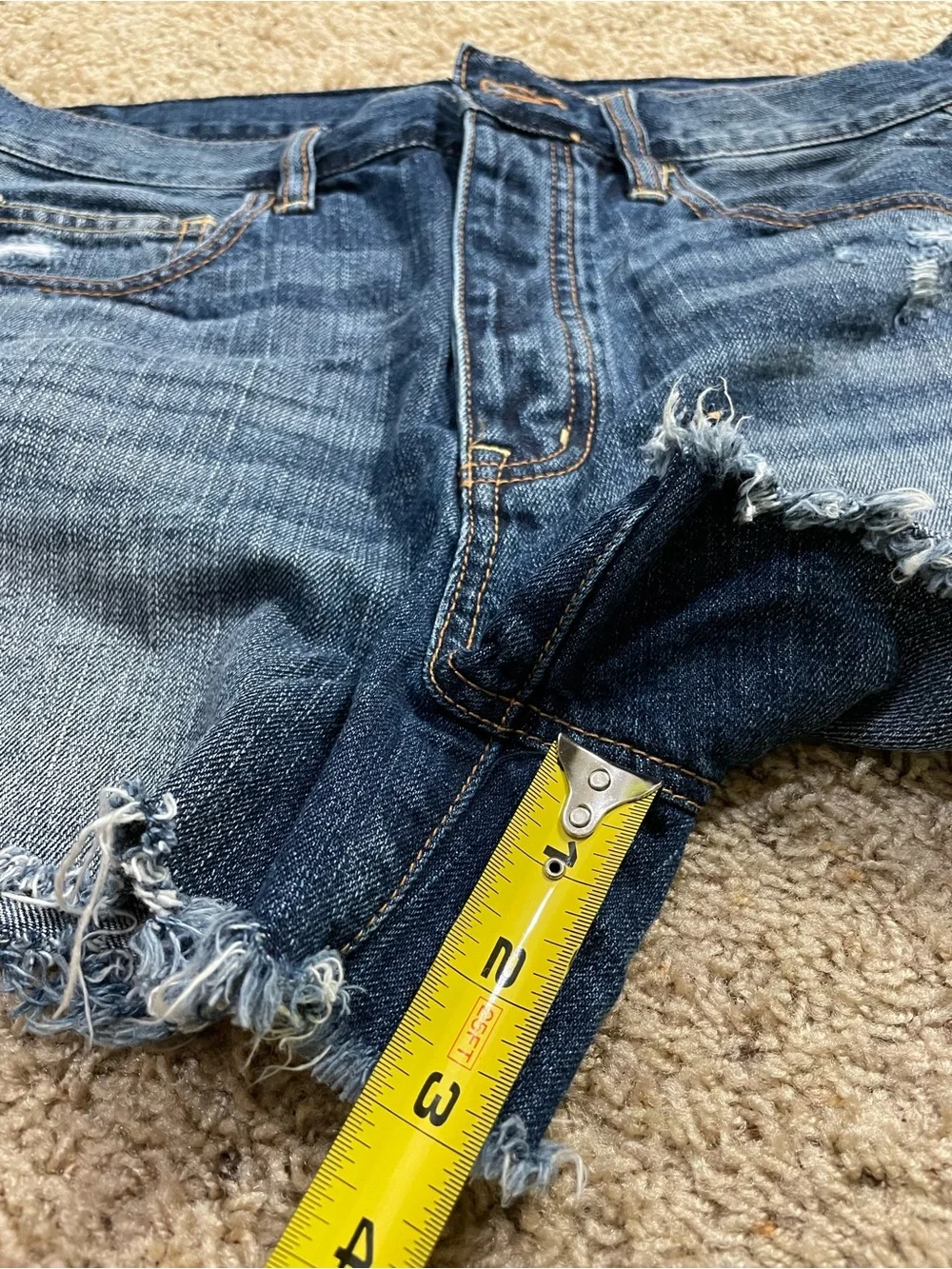Women’s American Eagle blue jean denim destructed cutoff shorts size 10/12 -READ